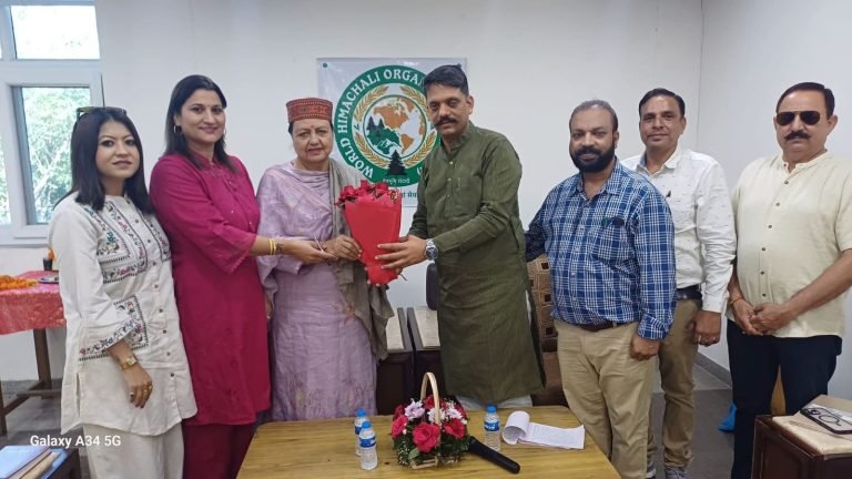 WHO Group Photo — Members Honored with Marigold Garlands
